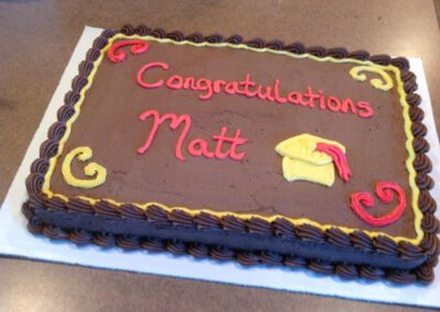 An eggless chocolate cake to congratulate Matt. The cake is made without eggs and is chocolate-flavored, perfect for celebrating a special occasion with Matt