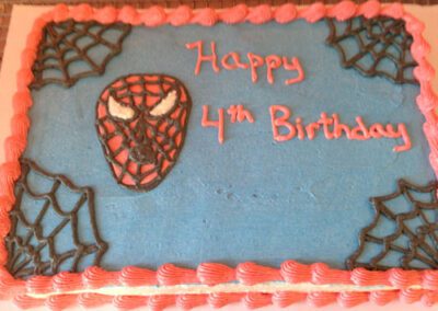 A Spider-Man themed 4th birthday cake.